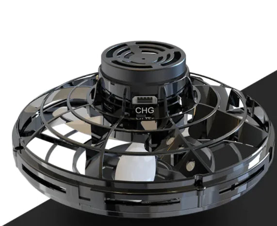 Close-up of a LED Flying Spinner Toy showcasing the black body and gyroscopic motor design.