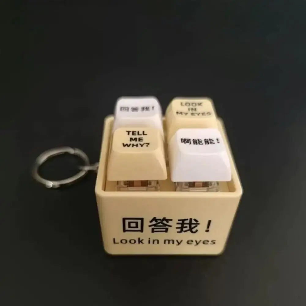 LOOKMYEYES™ Meme Voice Stress Toy with keys featuring quotes like 'Look in my eyes' and 'Tell me why'.