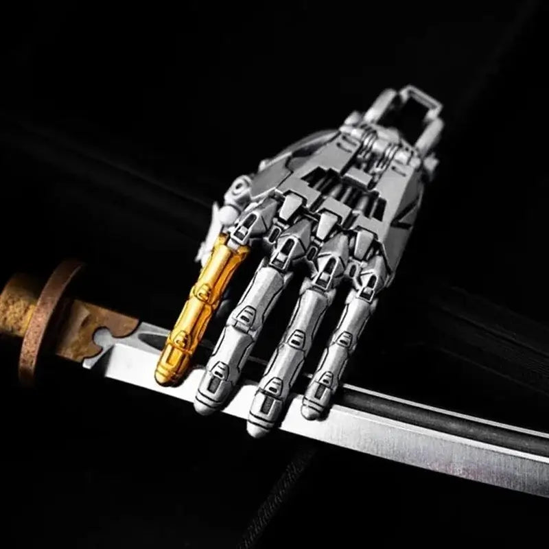 Collectible 5cm bionic robot hand pendant with movable joints, displayed on a sword, perfect for gifts.