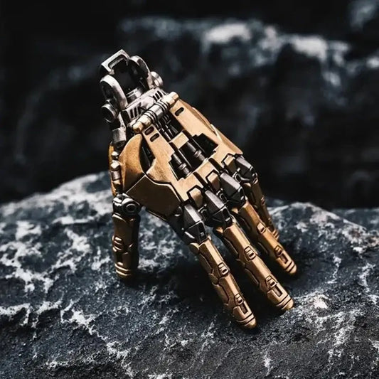 5cm collectible robot hand with movable fingers, stylish bionic design on a rocky surface, perfect decorative charm.