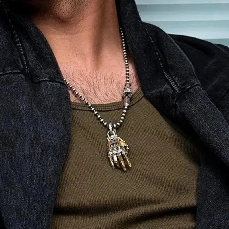 5cm collectible bionic robot hand pendant worn as a necklace, showcasing detailed craftsmanship and movable finger joints.
